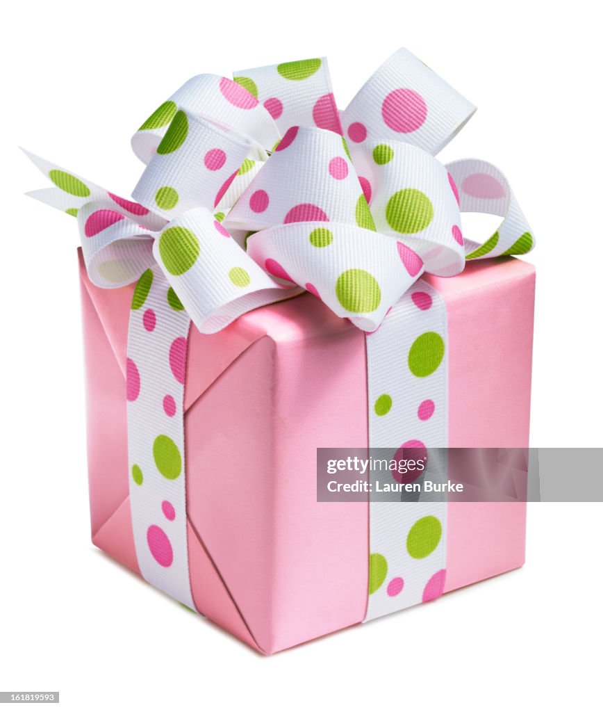 Pink and Polka dot gift on white background