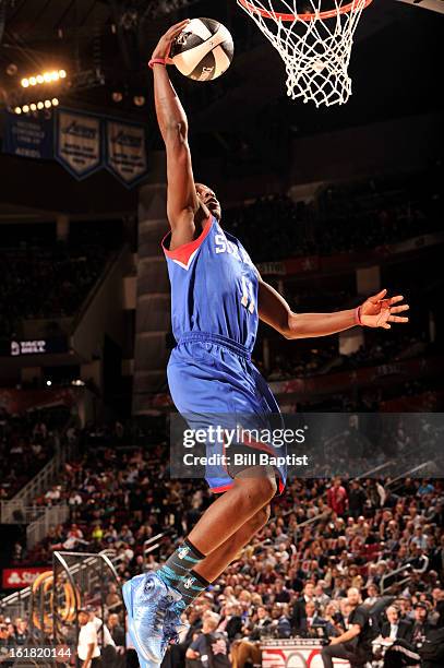 Jrue Holiday of the Philadelphia 76ers shoots the ball during the 2013 Taco Bell Skills Challenge on State Farm All-Star Saturday Night as part of...