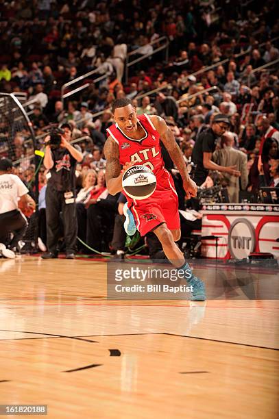 Jeff Teague of the Atlanta Hawks drives the ball during the 2013 Taco Bell Skills Challenge on State Farm All-Star Saturday Night as part of 2013 NBA...