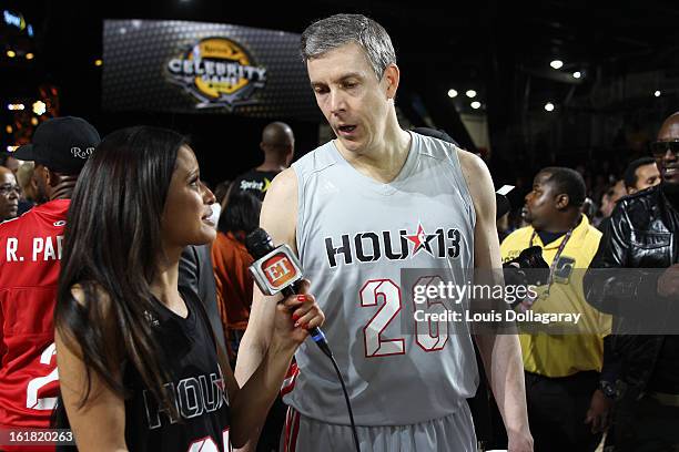 Rocsi Diaz and Arne Duncan attend the 2013 NBA All-Star Celebrity Game at George R. Brown Convention Center on February 15, 2013 in Houston, Texas.