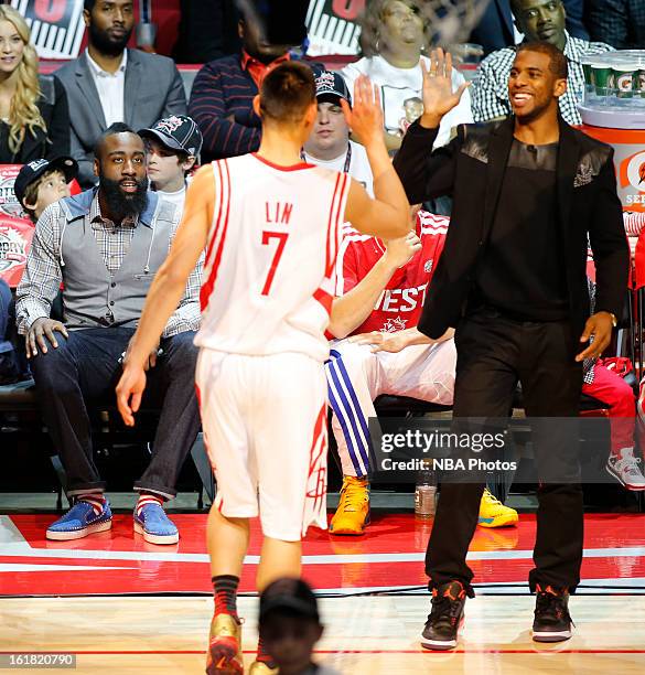 Chris Paul of the Los Angeles Clippers high fives Jeremy Lin of the Houston Rockets during the Sears Shooting Stars on State Farm All-Star Saturday...