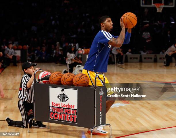 Paul George of the Indiana Pacers competes during the Foot Locker Three-Point Contest part of 2013 NBA All-Star Weekend at the Toyota Center on...