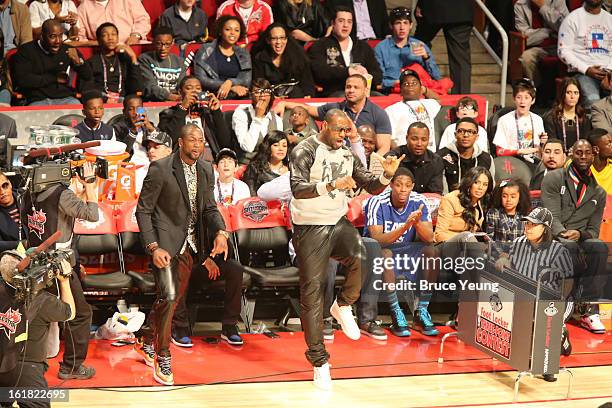 Dwyane Wade and LeBron James cheers during 2013 Foot Locker Three-Point Contest on State Farm All-Star Saturday Night as part of 2013 NBA All-Star...