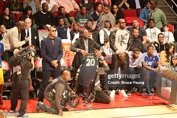 Carmelo Anthony and Dwyane Wade cheers during 2013 Foot Locker Three-Point Contest on State Farm All-Star Saturday Night as part of 2013 NBA All-Star...