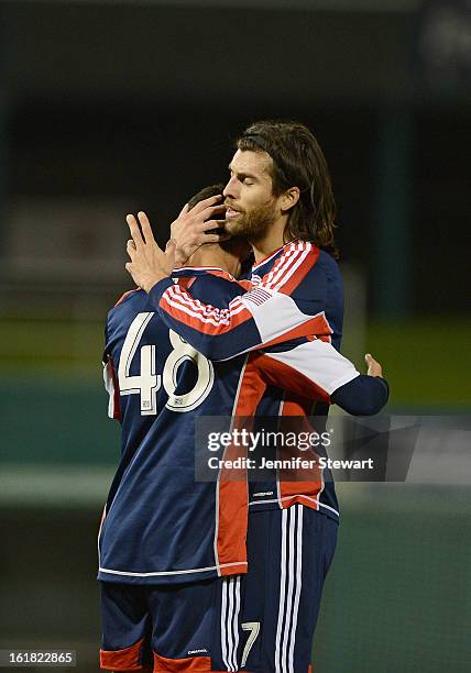 Marko Jesic of the New England Revolution is congratulated by teammate Juan Toja after scoring a goal against the New York Red Bulls in the second...