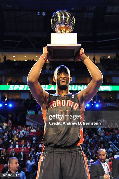 Terrence Ross of the Toronto Raptors hoists his trophy for winning the 2013 Sprite Slam Dunk Contest on State Farm All-Star Saturday Night as part of...