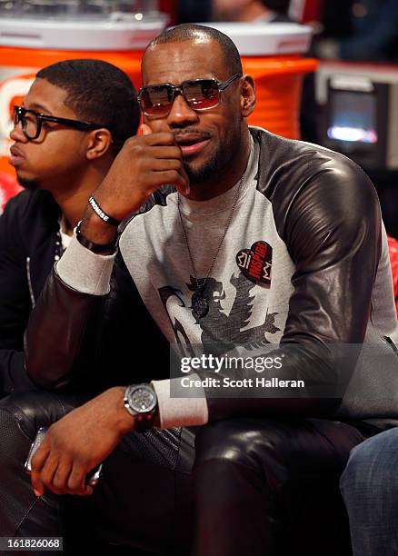 LeBron James of the Miami Heat watches during the Taco Bell Skills Challenge part of 2013 NBA All-Star Weekend at the Toyota Center on February 16,...