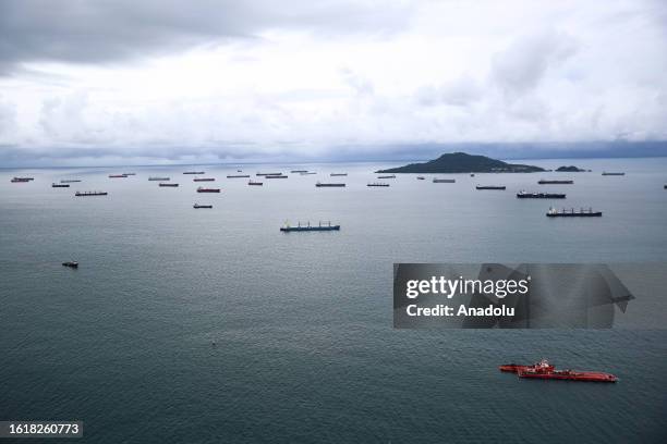 Ships are seen on Panama Canal in Panama City, Panama, on August 21, 2023. The Panama Canal Authority has reduced maximum ship weights and daily...