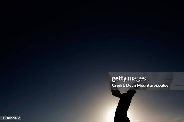 Jbe Kruger of South Africa hits a practice shot on the driving range prior to the Final Day of the Africa Open at East London Golf Club on February...