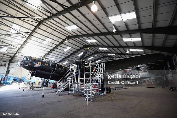 The Lancaster bomber "Just Jane", which is being restored with the aim of getting it airworthy, is parked in a hangar at Lincolnshire Aviation...
