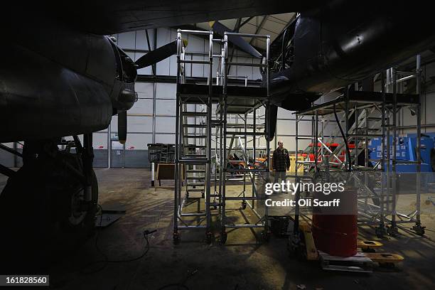 Engineers work on the Lancaster bomber "Just Jane" , with the aim of getting it airworthy, at Lincolnshire Aviation Heritage Centre on February 14,...