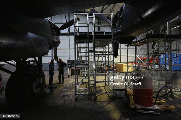 Engineers work on the Lancaster bomber "Just Jane" , with the aim of getting it airworthy, at Lincolnshire Aviation Heritage Centre on February 14,...