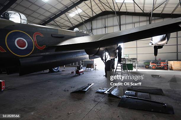 Engineer Bob Mitchell works on the Lancaster bomber "Just Jane" , with the aim of getting it airworthy, at Lincolnshire Aviation Heritage Centre on...