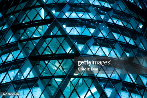 Modern Office Building Illuminated at Night Modern Office Building Illuminated at Night