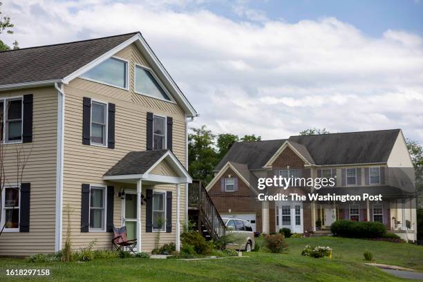 Single-family homes with ample yards are seen in Dumfries, Virginia, on August 13, 2023.