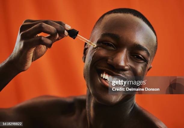 male beauty image - eye cream man stock pictures, royalty-free photos & images