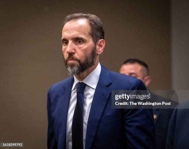Special Prosecutor Jack Smith walks away after addressing reporters after his grand jury has issued more indictments of former President Donald Trump...