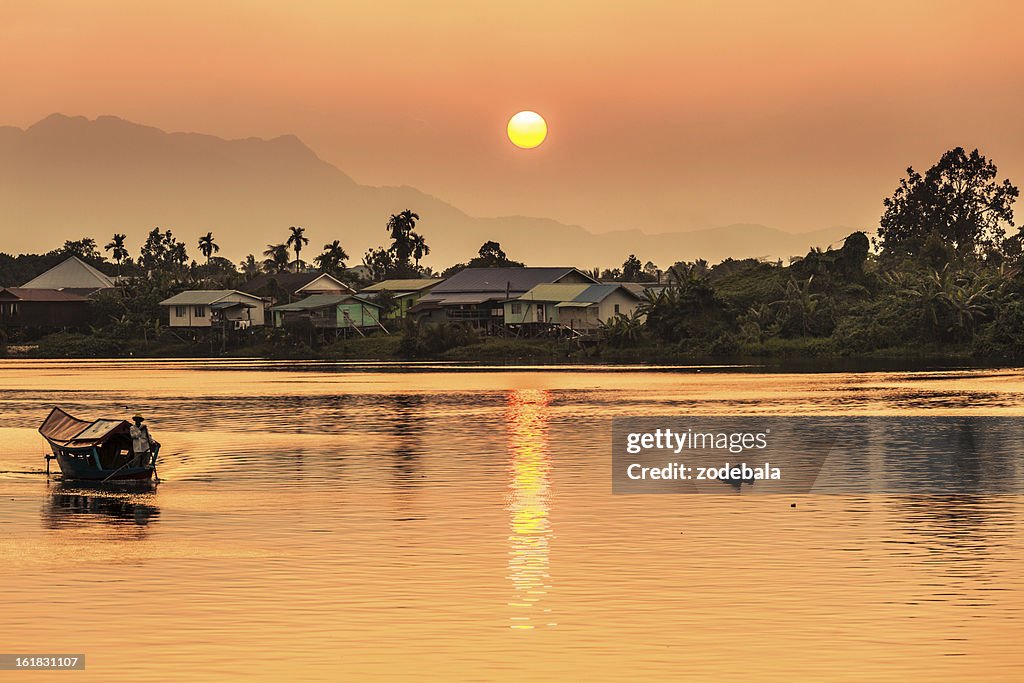 Sunset along river in Kuching, Borneo