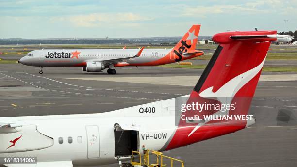 Photo taken on August 22, 2023 shows a Airbus A321 Neo operated by the Qantas low-cost airline Jetstar at Sydney´s Kingsford Smith Airport.