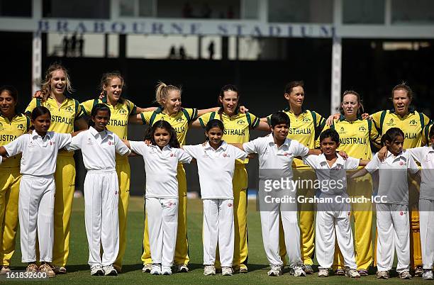 The Australian team at the singing of the national anthems ahead of the final between Australia and West Indies of the Women's World Cup India 2013...
