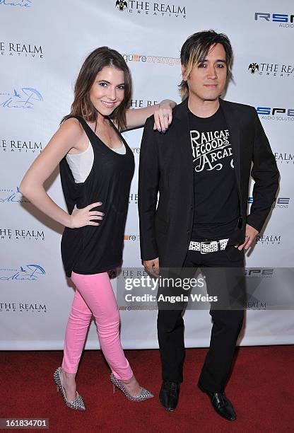 Rachel Talbott and Johnny Royal attend The Realm Creative red carpet premier party on February 16, 2013 in Los Angeles, California.