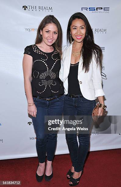 Gisselle Malsitano and Christine Chang attend The Realm Creative red carpet premier party on February 16, 2013 in Los Angeles, California.