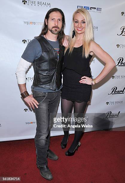 Brian Groh and Tanya Dahl attend The Realm Creative red carpet premier party on February 16, 2013 in Los Angeles, California.