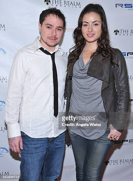 Joshua Shelton and Vicki Bakis attend The Realm Creative red carpet premier party on February 16, 2013 in Los Angeles, California.