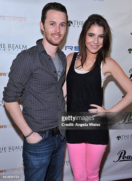 Byron and Rachel Talbott attend The Realm Creative red carpet premier party on February 16, 2013 in Los Angeles, California.