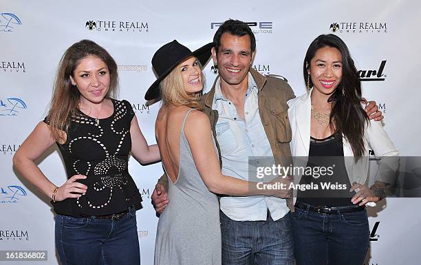 Gisselle Malsitano, Janna Williams, Dave Baez and Christine Chang attend The Realm Creative red carpet premier party on February 16, 2013 in Los...