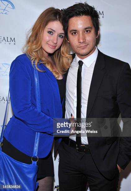 Amanda Stephens and Carl Himmelman attend The Realm Creative red carpet premier party on February 16, 2013 in Los Angeles, California.