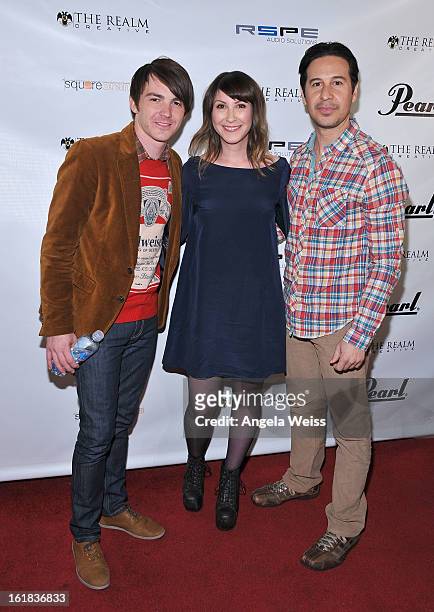 Drake Bell, Sara Lissner and Jarrod Parra attend The Realm Creative red carpet premier party on February 16, 2013 in Los Angeles, California.