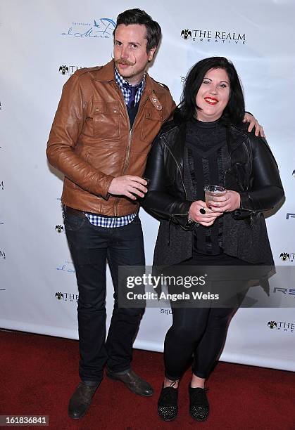 Luke Ford and April Scott attend The Realm Creative red carpet premier party on February 16, 2013 in Los Angeles, California.