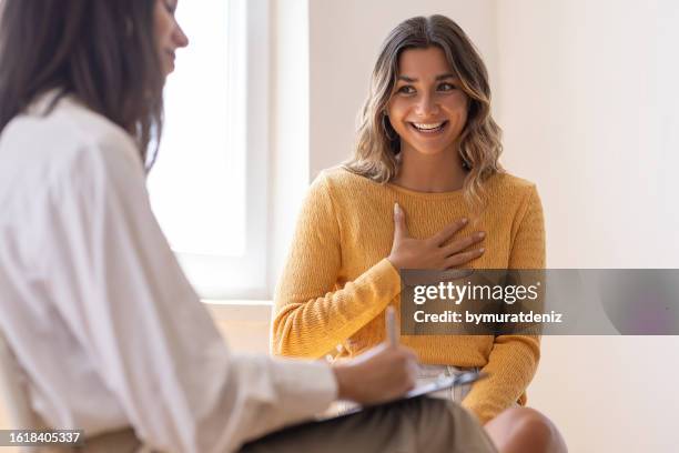 psychologist listening to her patient - resilience work stock pictures, royalty-free photos & images