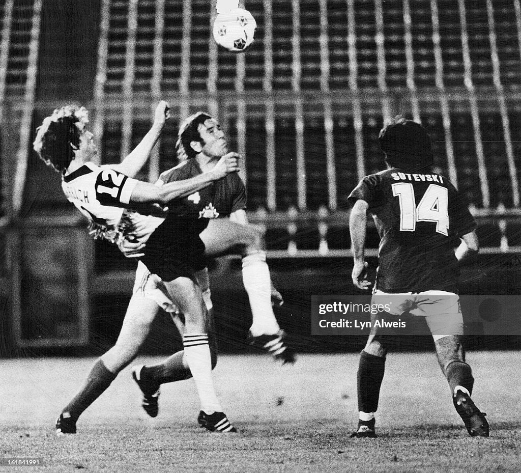 JUL 12 1978, JUL 13 1978; High-Stepping Caribou Draws Penalty In 3-0 Loss To Toronto Metros; Colorado's Bob Rohrbach (12) was called for high kicking as he moved between Filip Blaskovic and Damir Sutevski.;
