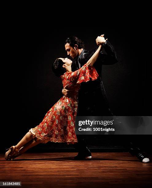 dance of passion tango - tango argentina stock pictures, royalty-free photos & images