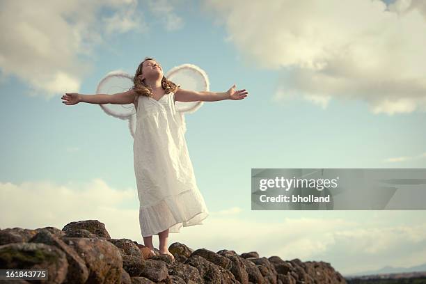 child praying - baby angel wings stock pictures, royalty-free photos & images