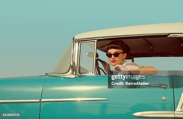 on the road again - 60s fashion woman stock pictures, royalty-free photos & images