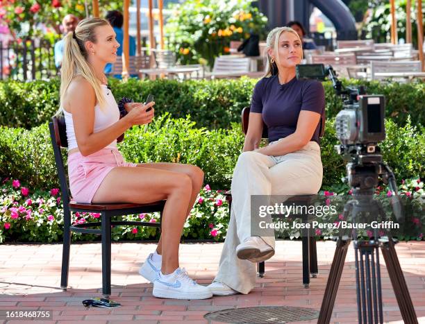 Katie Boulter and Emma Paton are seen during an interview for US Open Fan Week outside the Arthur Ashe Stadium on August 22, 2023 in New York City.