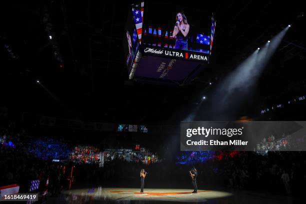 Entertainer Lorena Peril, host of the "Fantasy" show at Luxor Hotel and Casino, performs the United States national anthem before the 2023...