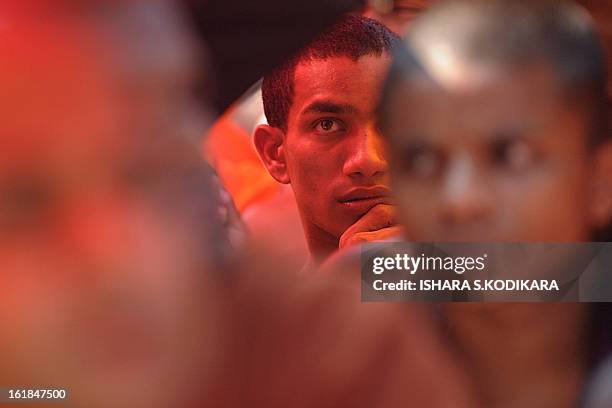Sri Lankan Buddhist monk takes part in a rally calling for a ban on Islamic halal-slaughtered meat at Maharagama, a suburb of the capital Colombo,...