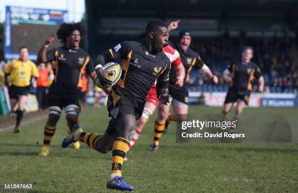 Christian Wade of Wasps breaks clear to score a try during the Aviva Premiership match between London Wasps and Gloucester at Adams Park on February...