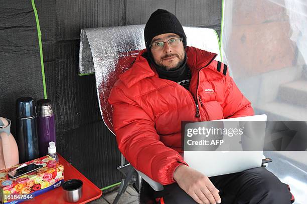 Armenian presidential candidate Andrias Ghukasyan sits in a tent in central Yerevan, on February 17 as he holds a hunger strike. Ghukasyan went on...