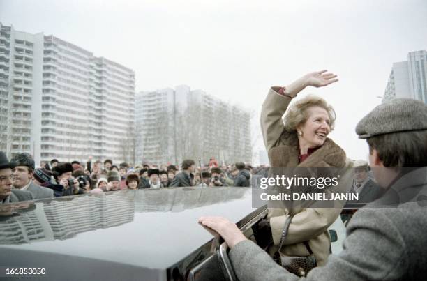 British Prime Minister Margaret Thatcher greets curious Moscovites who gathered to see her on March 29, 1987 in Moscow, during her official visit in...