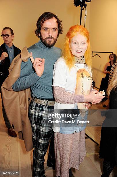 Andreas Kronthaler and Dame Vivienne Westwood attend the Vivienne Westwood Red Label show during London Fashion Week Fall/Winter 2013/14 at the...