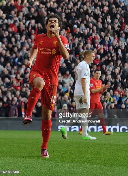 Philippe Coutinho of Liverpool celebrates his goal during the Barclays Premier League match between Liverpool and Swansea City at Anfield on February...