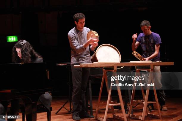 Musicians Xan Errotabehere and Thierry Biscary of the Kalakan Trio practices their percussion instruments during rehearsal with French sisters,...