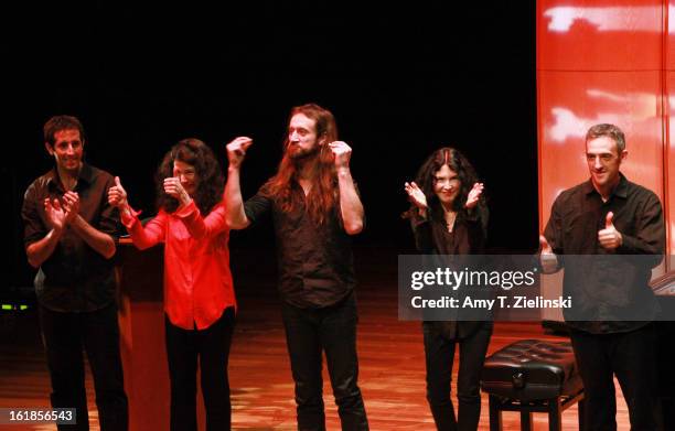 French sisters, concert pianists Katia Labeque and Marielle Labeque take a bow with their percussionists Jamixel Bereau , Xan Errotabehere and...
