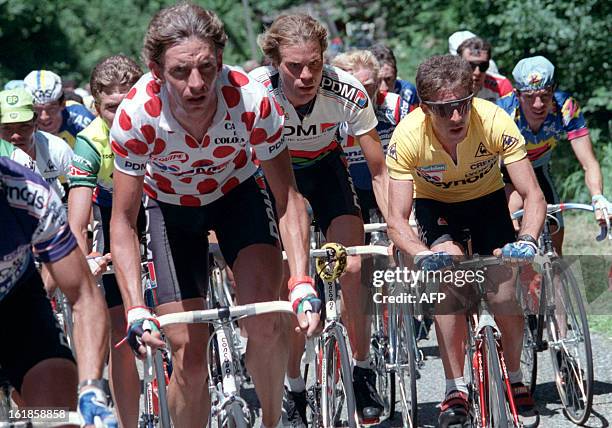 Dutch Steven Rooks, wearing the red and white Polka Dot Jersey of the best climber, Dutch Gert-Jan Theunisse and Spaniard Pedro Delgado, wearing the...