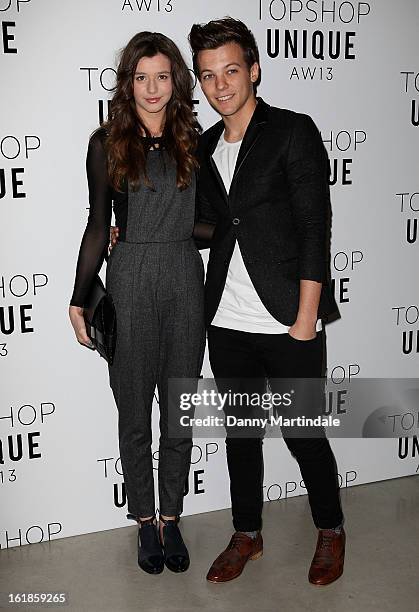 Louis Tomlinson and girlfriend Eleanor Calder attends the Unique show during London Fashion Week Fall/Winter 2013/14 at TopShop Show Space on...